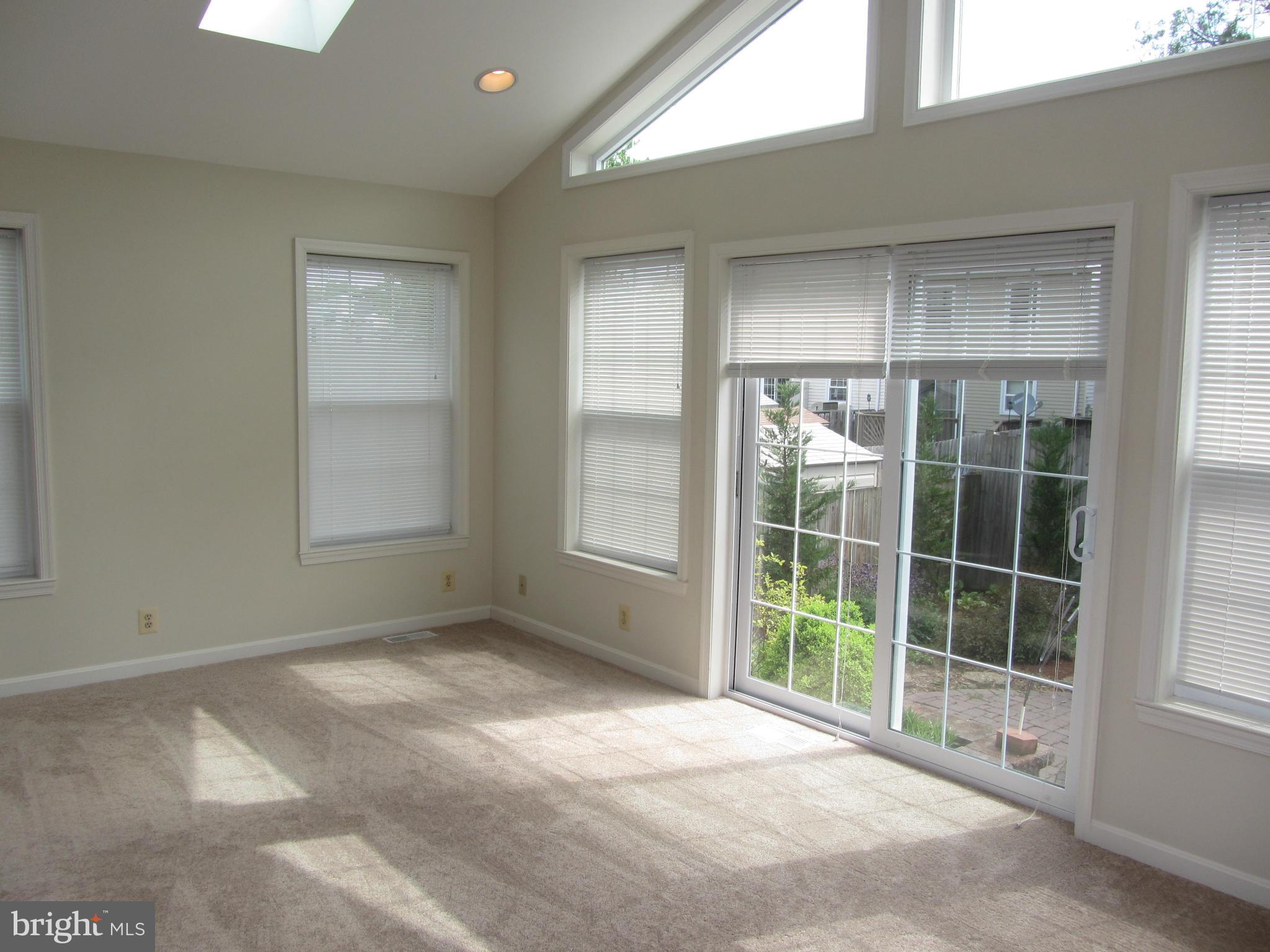 9003 Transoms Road Baltimore, MD 21236 - Photo 6 of 29 a view of an empty room with a window