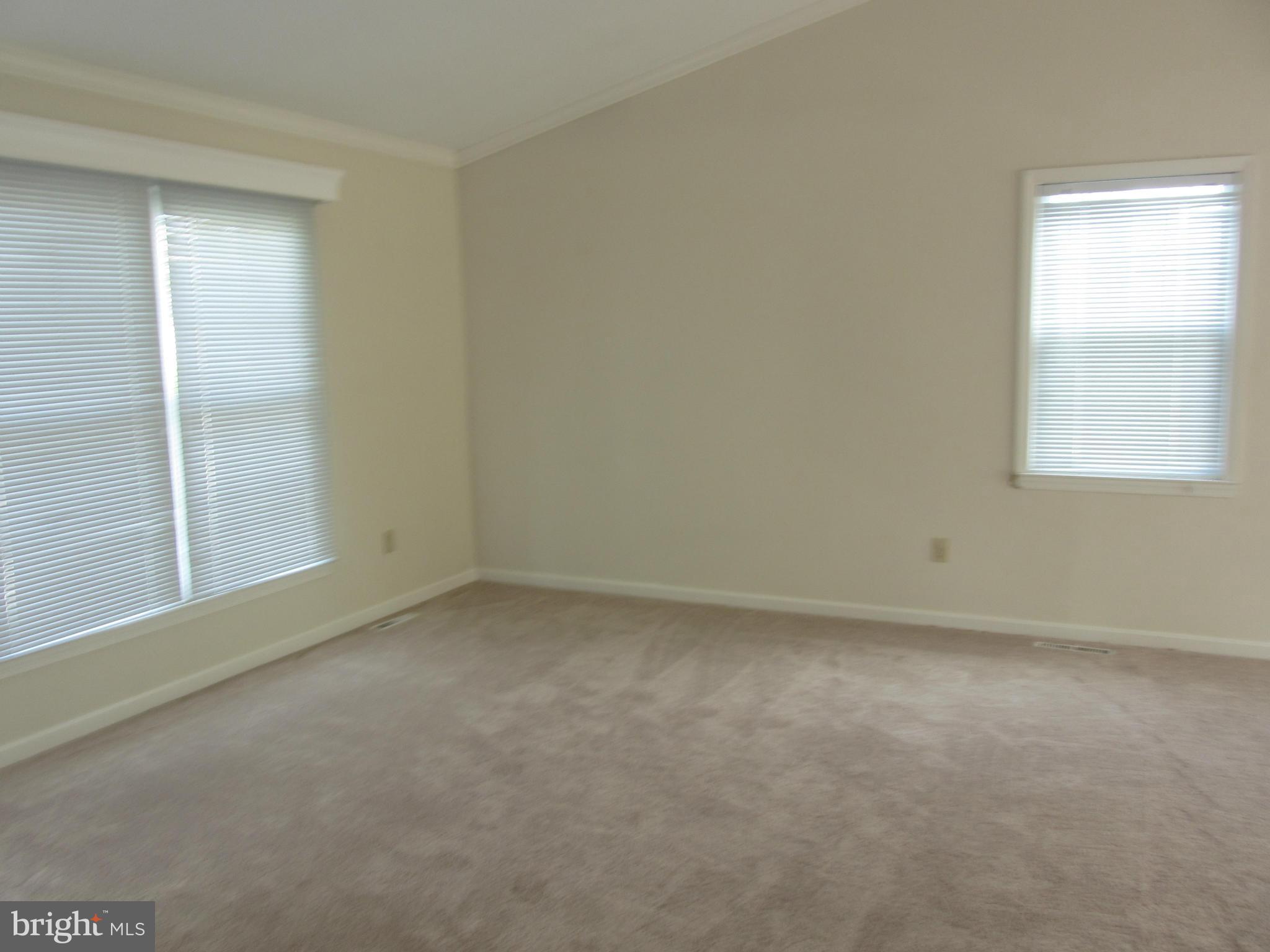 9003 Transoms Road Baltimore, MD 21236 - Photo 8 of 29 an empty room with a window