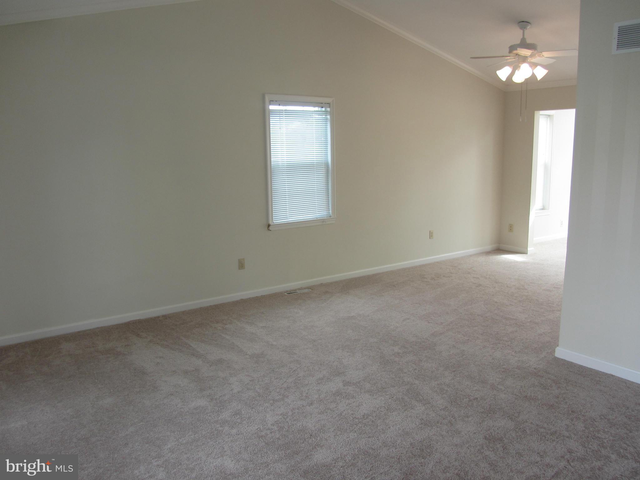 9003 Transoms Road Baltimore, MD 21236 - Photo 9 of 29 an empty room with a window