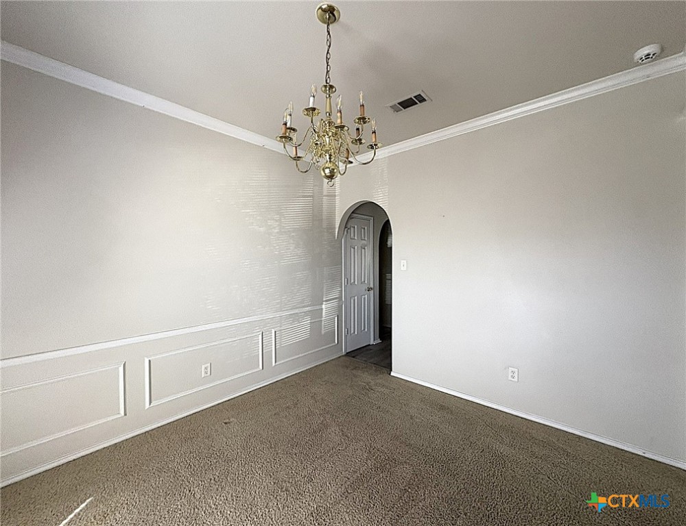 2313 Modoc Drive Harker Heights, TX 76548 - Photo 11 of 34 a view of a livingroom with a chandelier fan