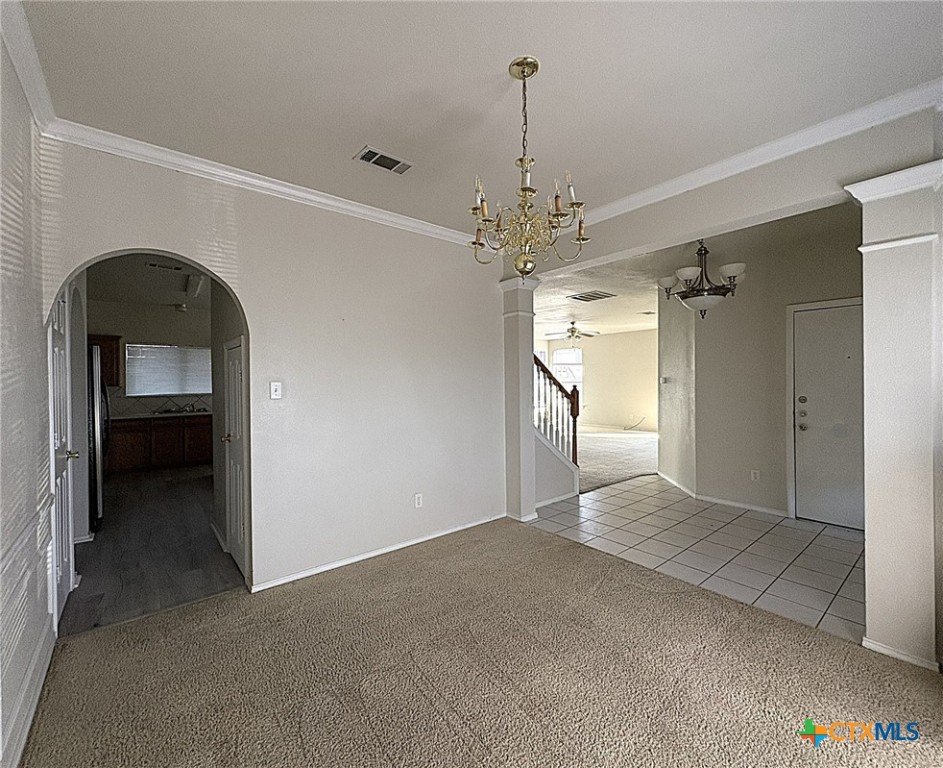 2313 Modoc Drive Harker Heights, TX 76548 - Photo 12 of 34 a view of a hallway with a chandelier