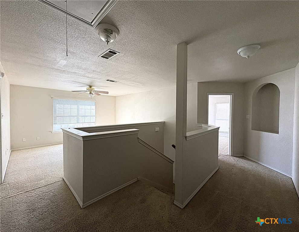 2313 Modoc Drive Harker Heights, TX 76548 - Photo 16 of 34 a kitchen with cabinets and wooden floor