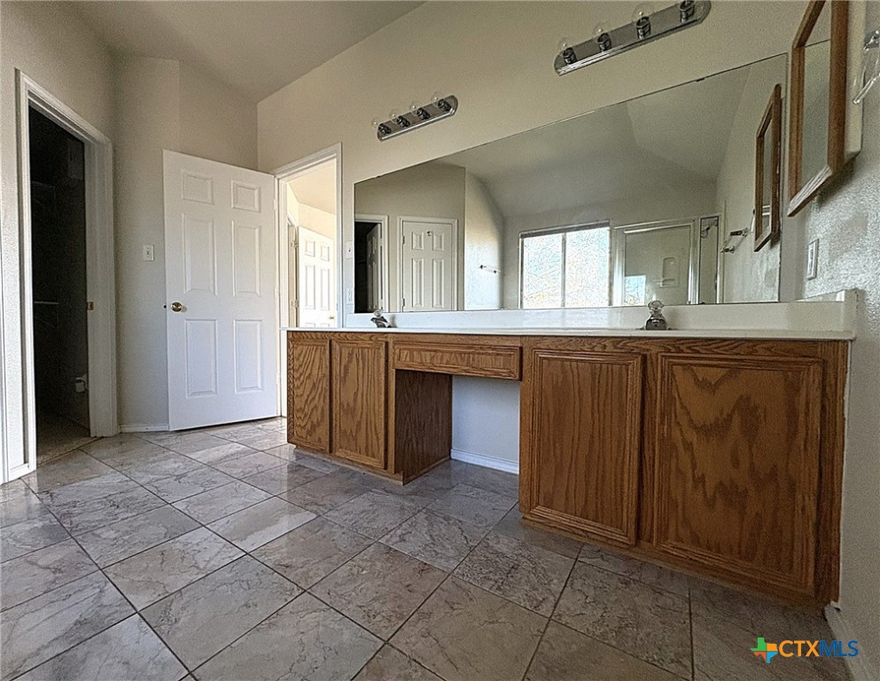 2313 Modoc Drive Harker Heights, TX 76548 - Photo 26 of 34 a view of a kitchen with cabinets