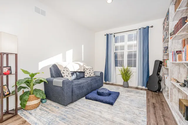 a living room with furniture and a couch