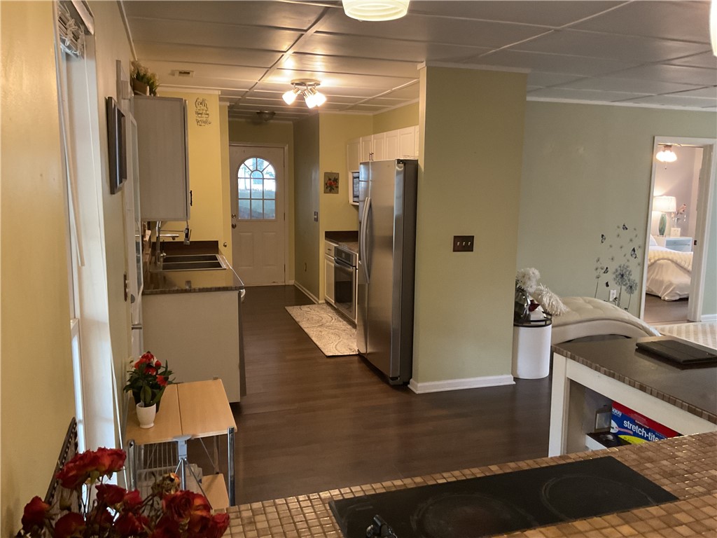 229 Cub Cove Drive Walhalla, SC 29691 - Photo 10 of 50 This spacious kitchen offers ample counter space, modern appliances, and a seamless flow into adjacent living areas.