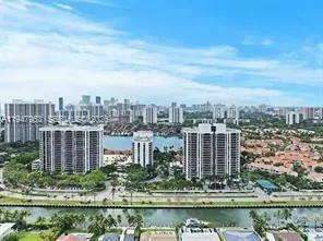 a view of a city with tall buildings