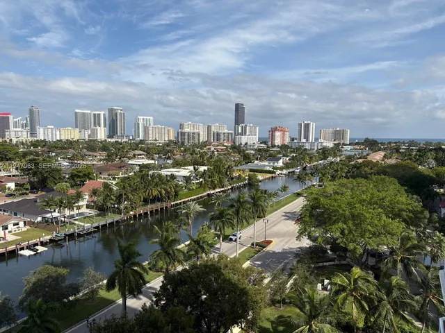 a view of a lake with a city