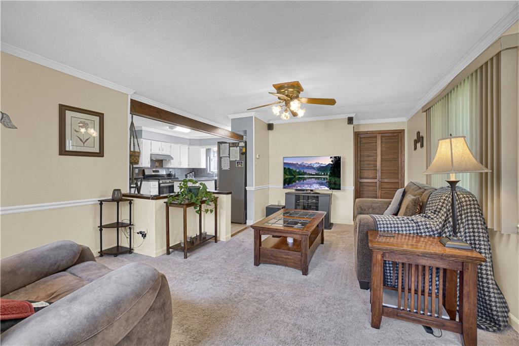 349 Rockhill Road Pittsburgh, PA 15243 - Photo 14 of 25 a living room with furniture and wooden floor