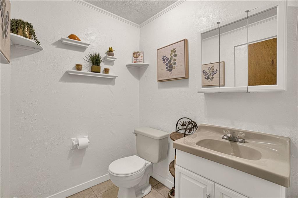 349 Rockhill Road Pittsburgh, PA 15243 - Photo 15 of 25 a bathroom with a sink and a toilet
