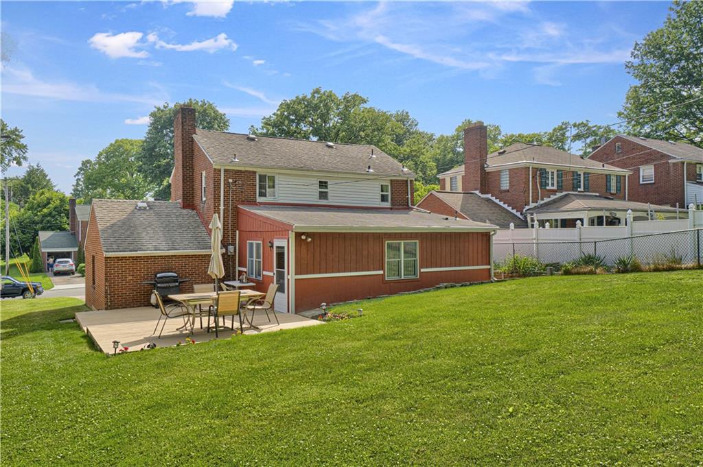 349 Rockhill Road Pittsburgh, PA 15243 - Photo 23 of 25 a front view of a house with a garden and yard