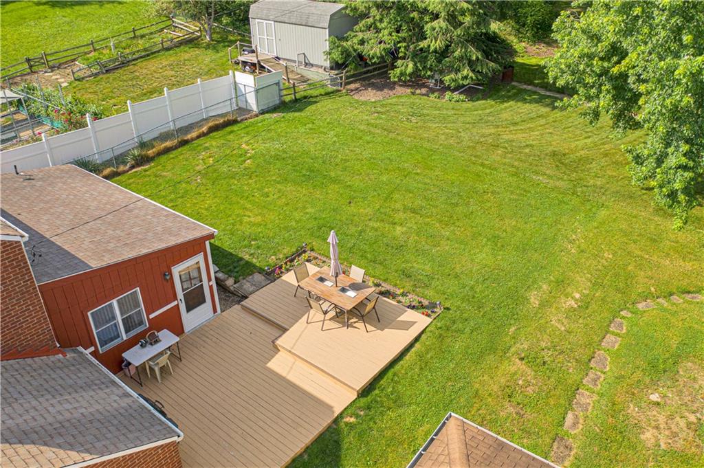 349 Rockhill Road Pittsburgh, PA 15243 - Photo 24 of 25 a view of a backyard with plants and patio