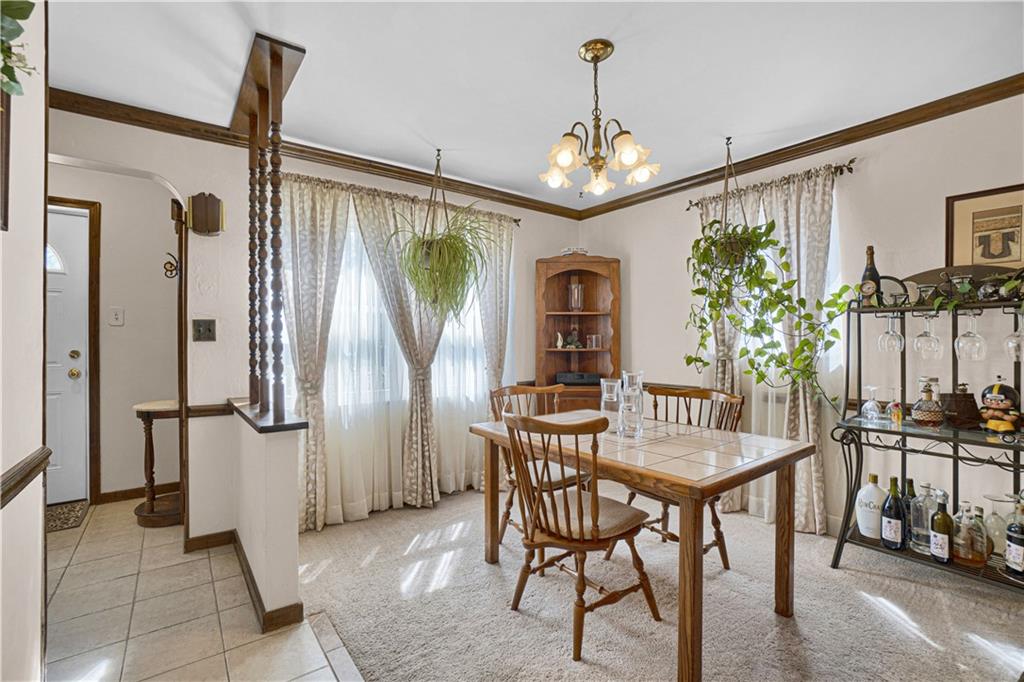 349 Rockhill Road Pittsburgh, PA 15243 - Photo 8 of 25 a view of a dining room with furniture window and wooden floor