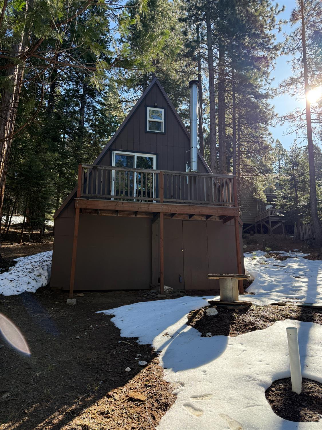 392 Boards Crossing Road Arnold, CA 95223 - Photo 2 of 31 a front view of a house with a yard