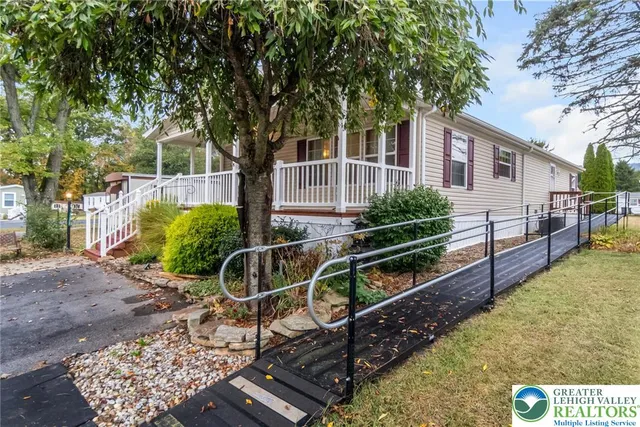 a house view with a garden space