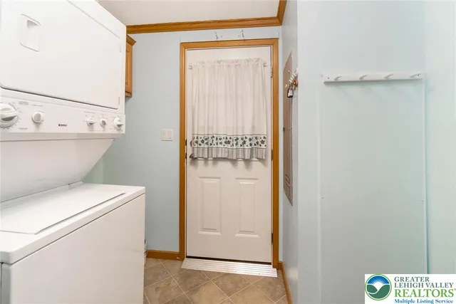 a view of bathroom with washer and dryer