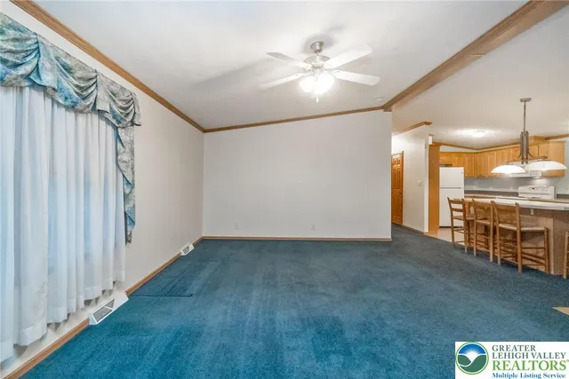 a view of a livingroom with furniture