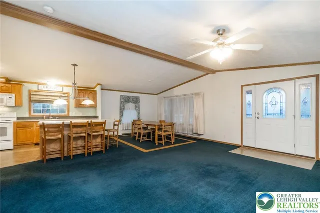 a view of a livingroom with furniture