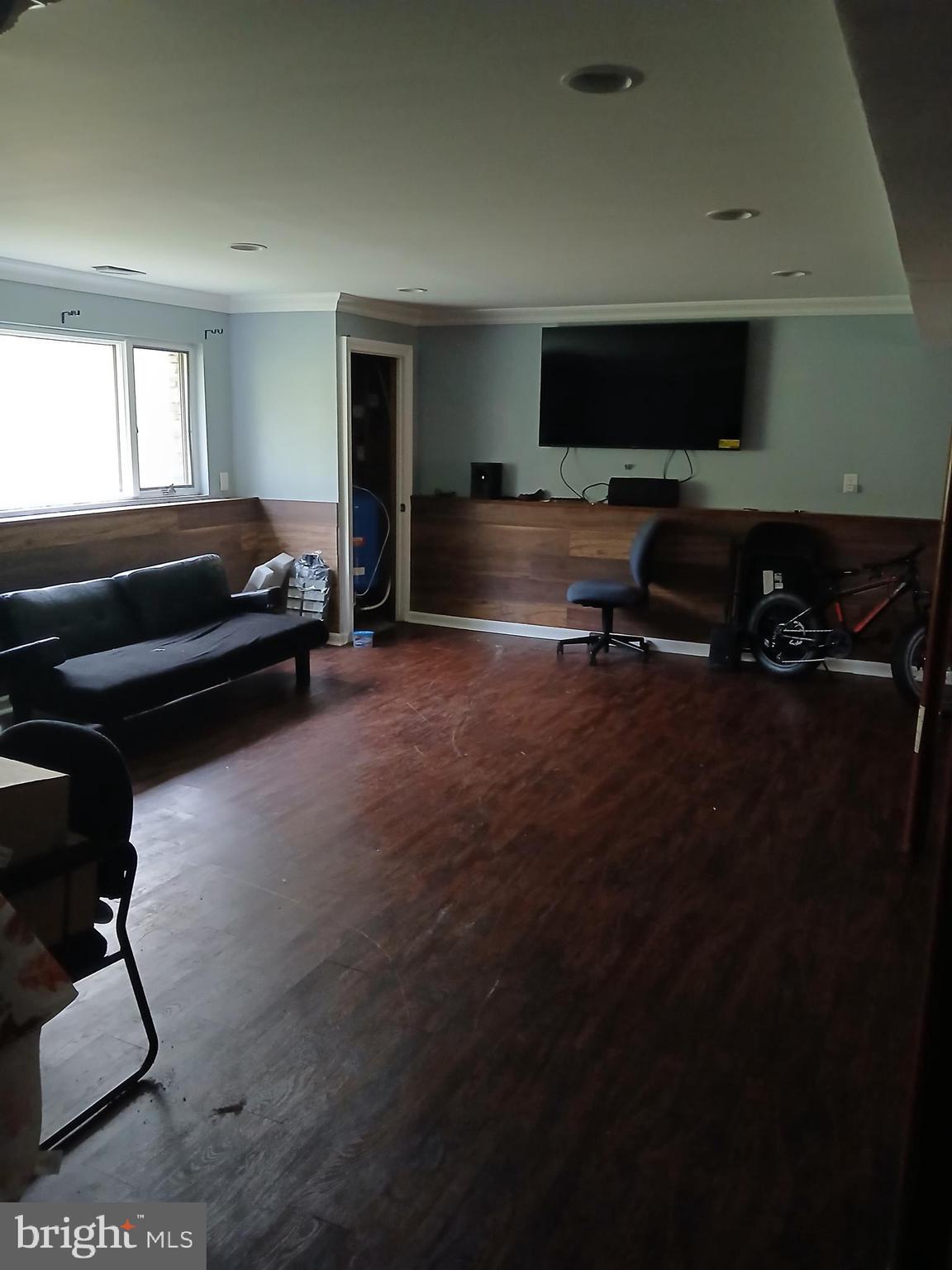 1540 Nicodemus Road Reisterstown, MD 21136 - Photo 12 of 12 a living room with furniture and a flat screen tv