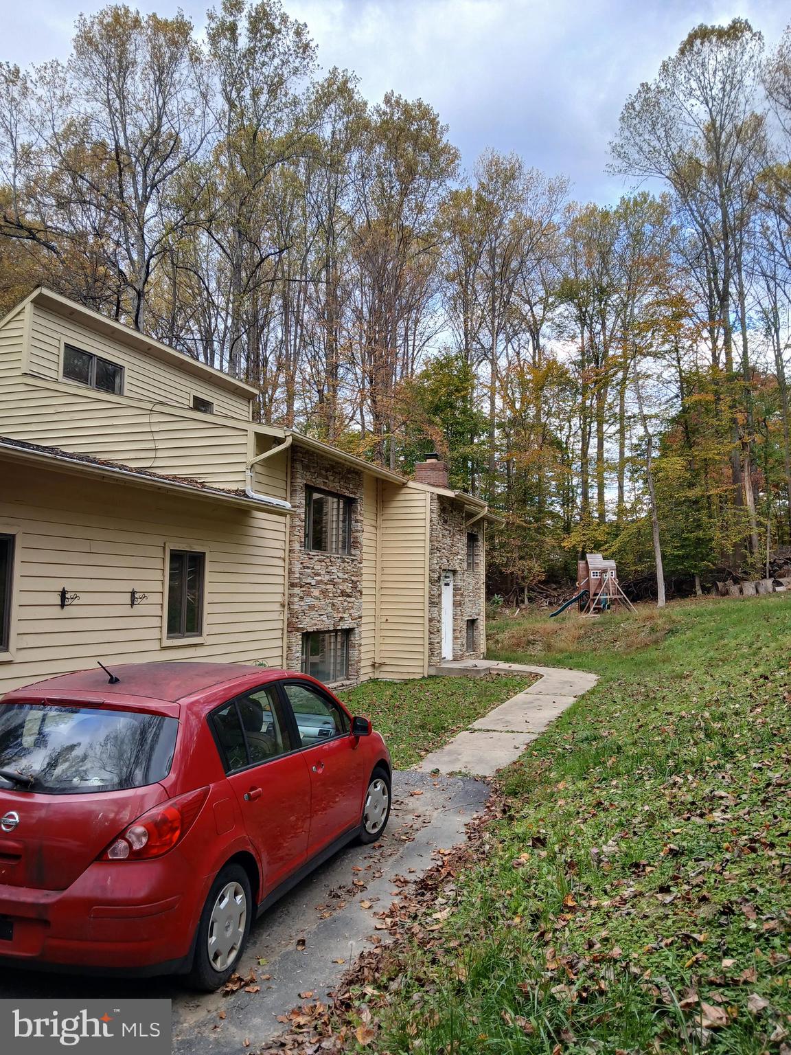 1540 Nicodemus Road Reisterstown, MD 21136 - Photo 2 of 12 a front view of a house with garden