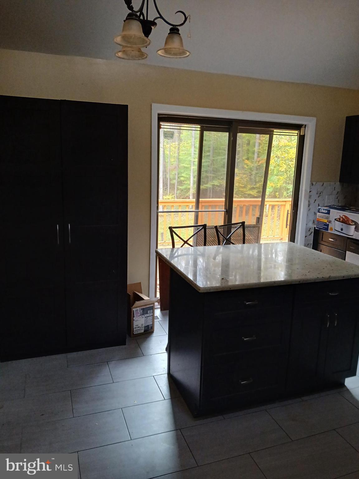 1540 Nicodemus Road Reisterstown, MD 21136 - Photo 6 of 12 a living room with a large window and a sink