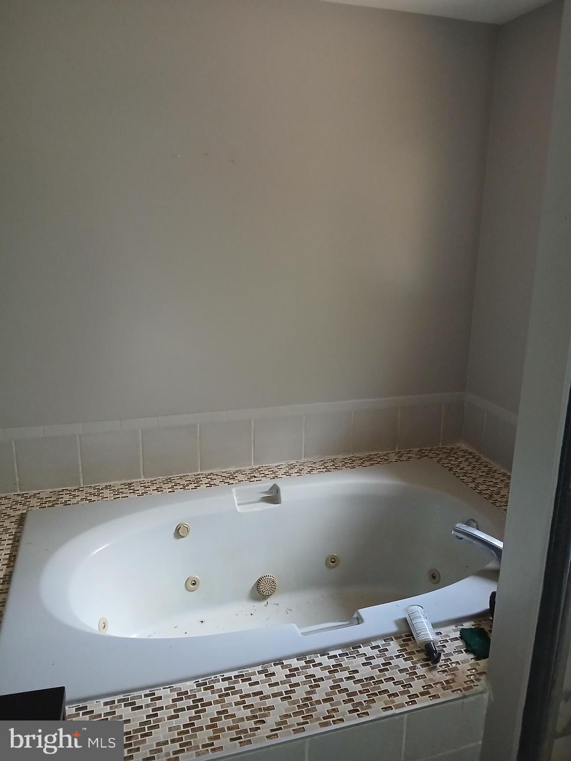 1540 Nicodemus Road Reisterstown, MD 21136 - Photo 8 of 12 a bathroom with a bathtub and a sink