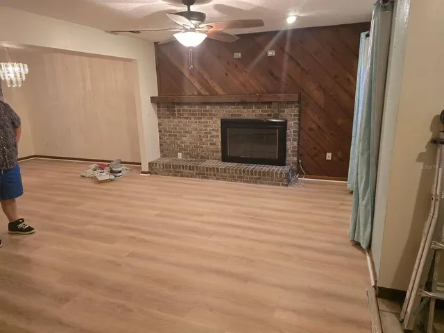 a kitchen with a sink stainless steel appliances and counter space
