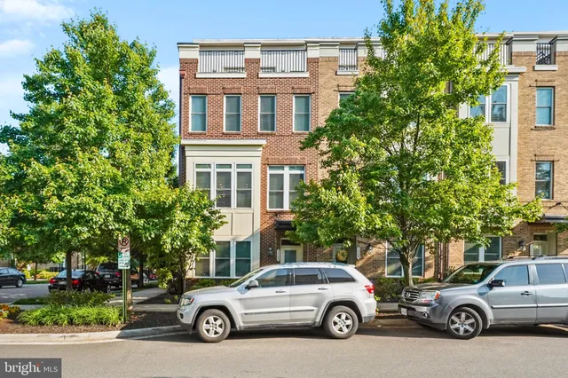 a car parked in front of a house