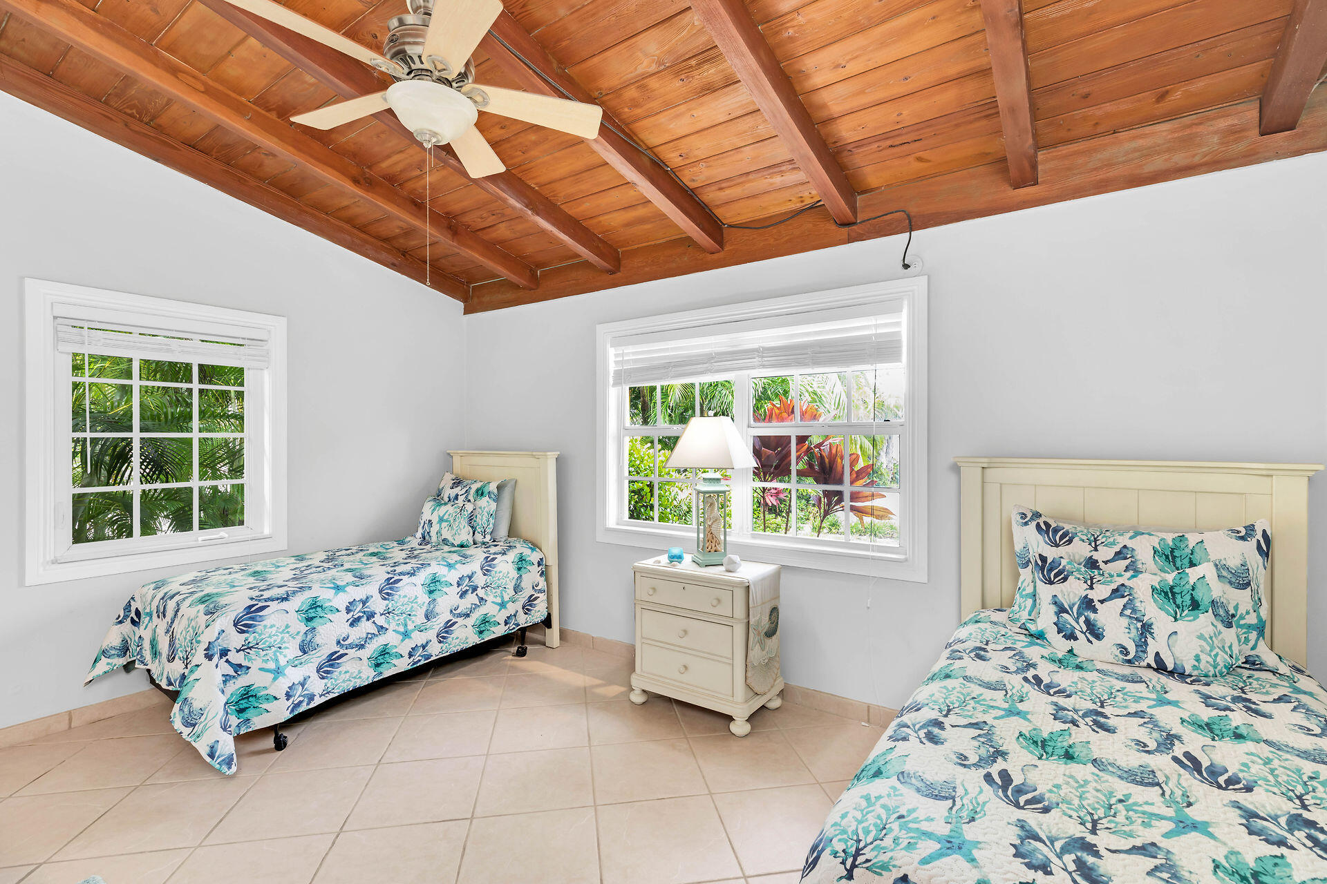 33 Bay Drive Key West, FL 33040 - Photo 19 of 35 a bedroom with a bed and a window