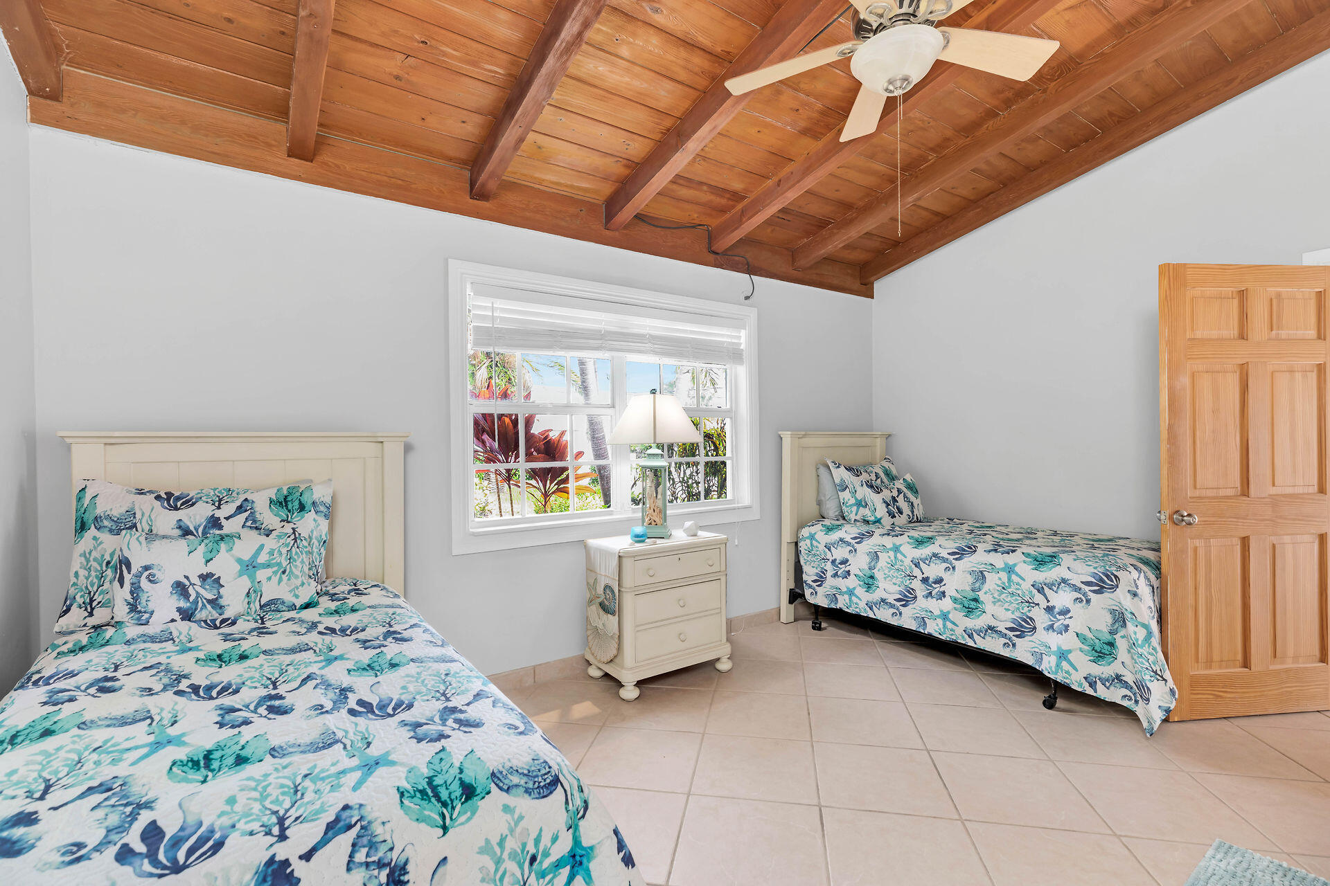 33 Bay Drive Key West, FL 33040 - Photo 20 of 35 a bedroom with a bed and a window