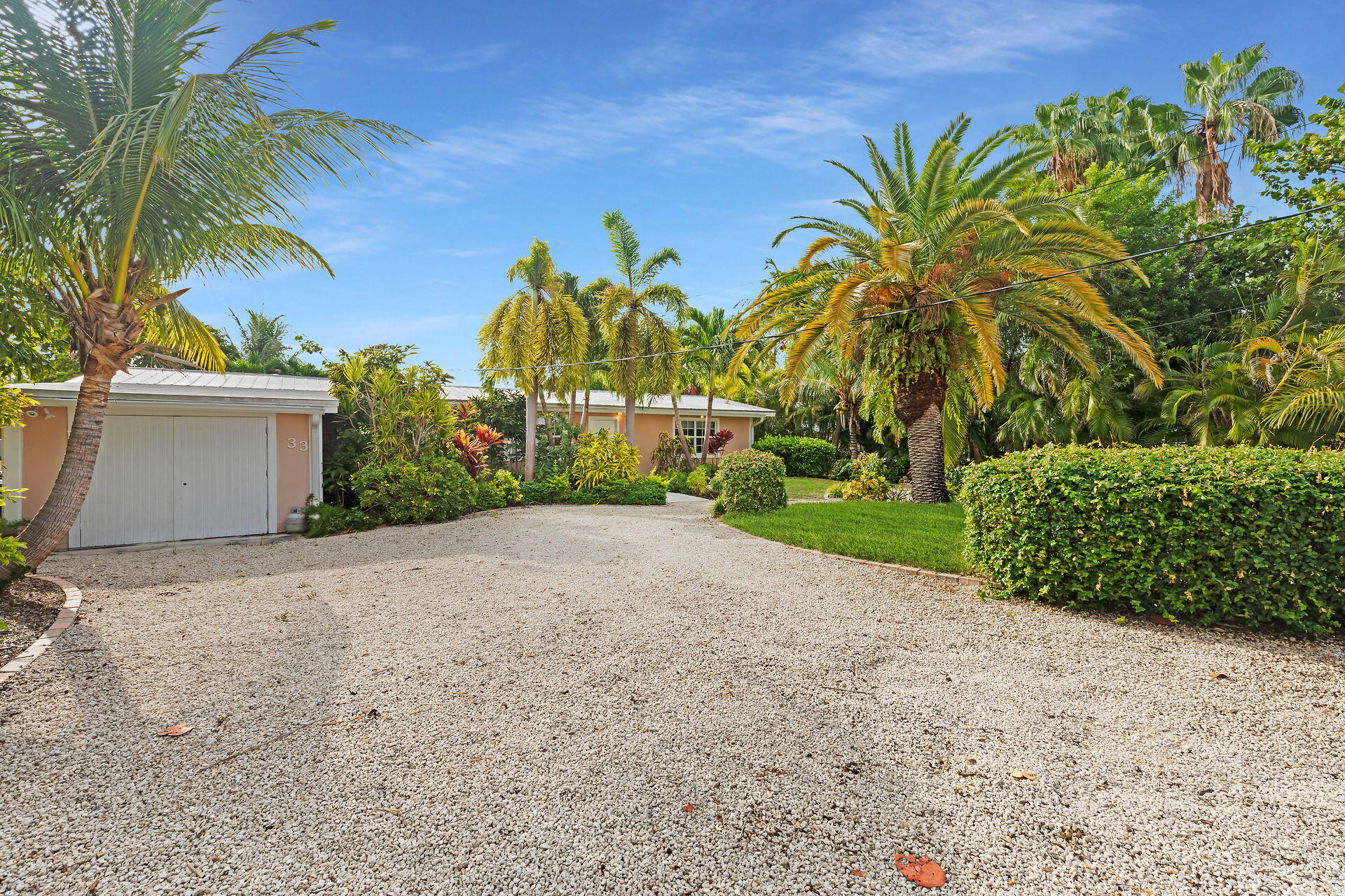 33 Bay Drive Key West, FL 33040 - Photo 35 of 35 a view of a yard with a house and a trees