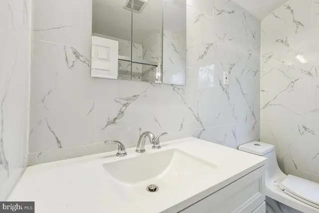 a bathroom with a sink and a toilet