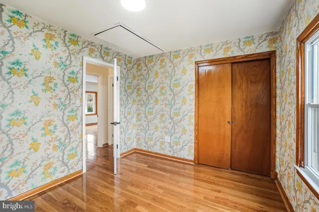 a view of entryway with wooden floor