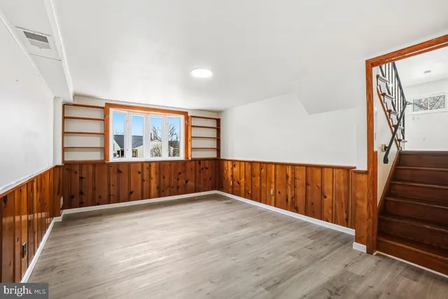 a view of entryway with wooden floor
