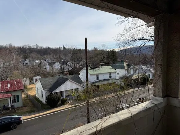 a view of a city from a balcony