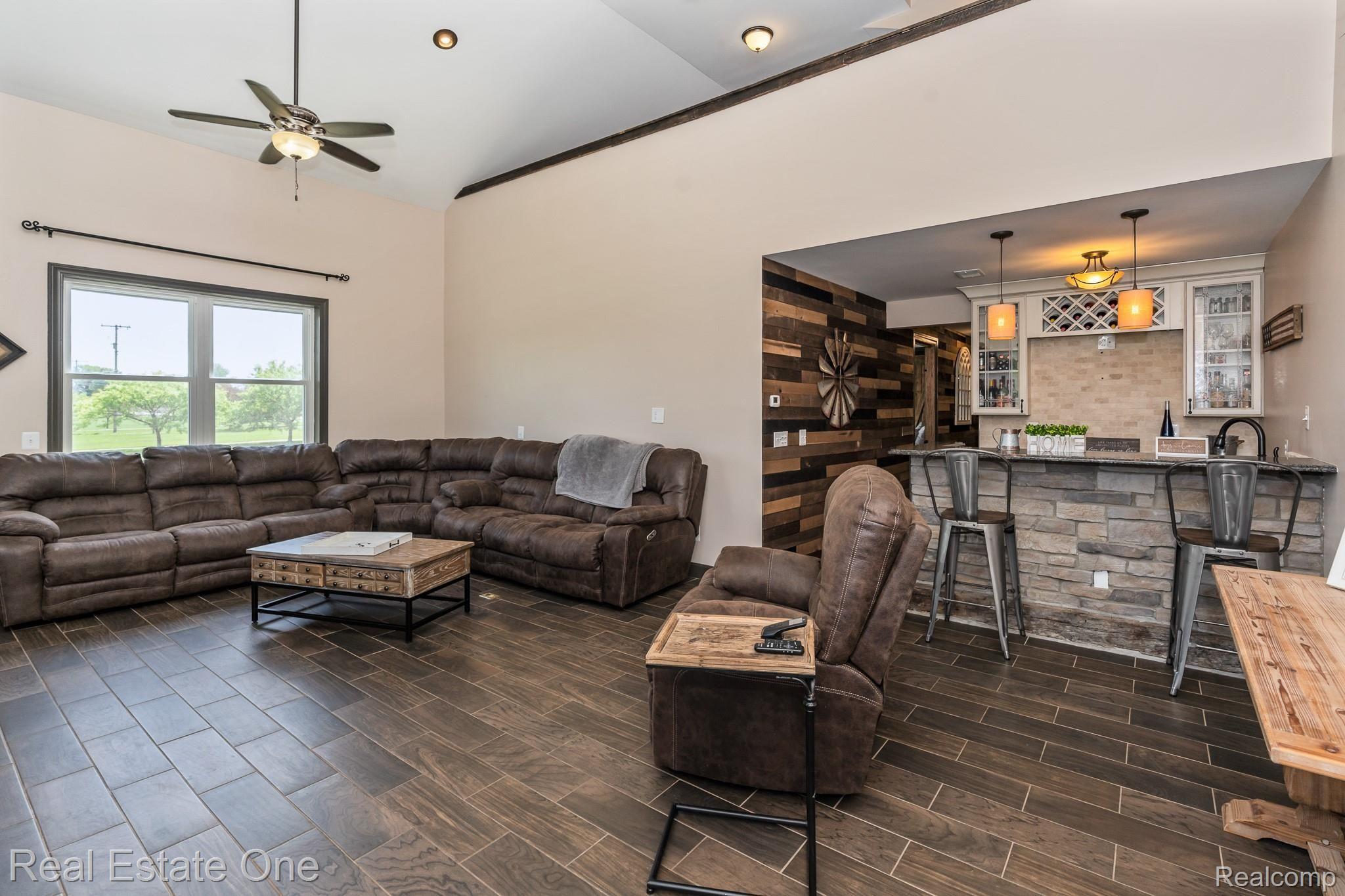 8047 Perry Road Grand Blanc, MI 48439 - Photo 31 of 48 Wet bar gathering area right in the great room!
