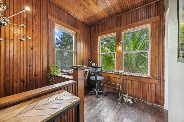 a view of a room with a large window