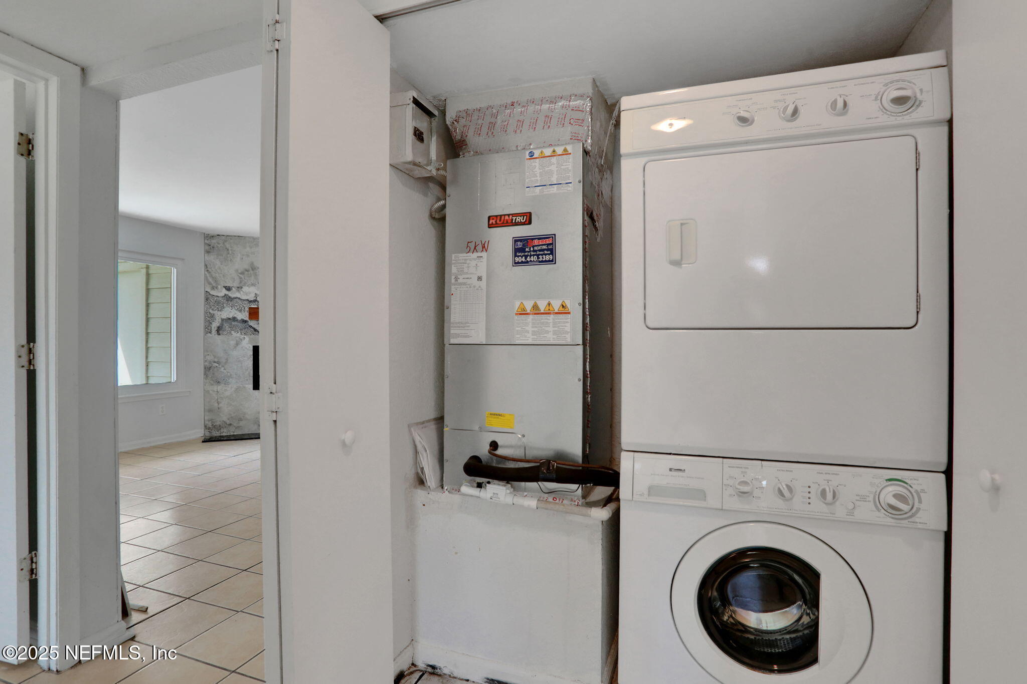 791 Assisi Lane, Unit 1704 Jacksonville, FL 32233 - Photo 14 of 16 a utility room with dryer and washer