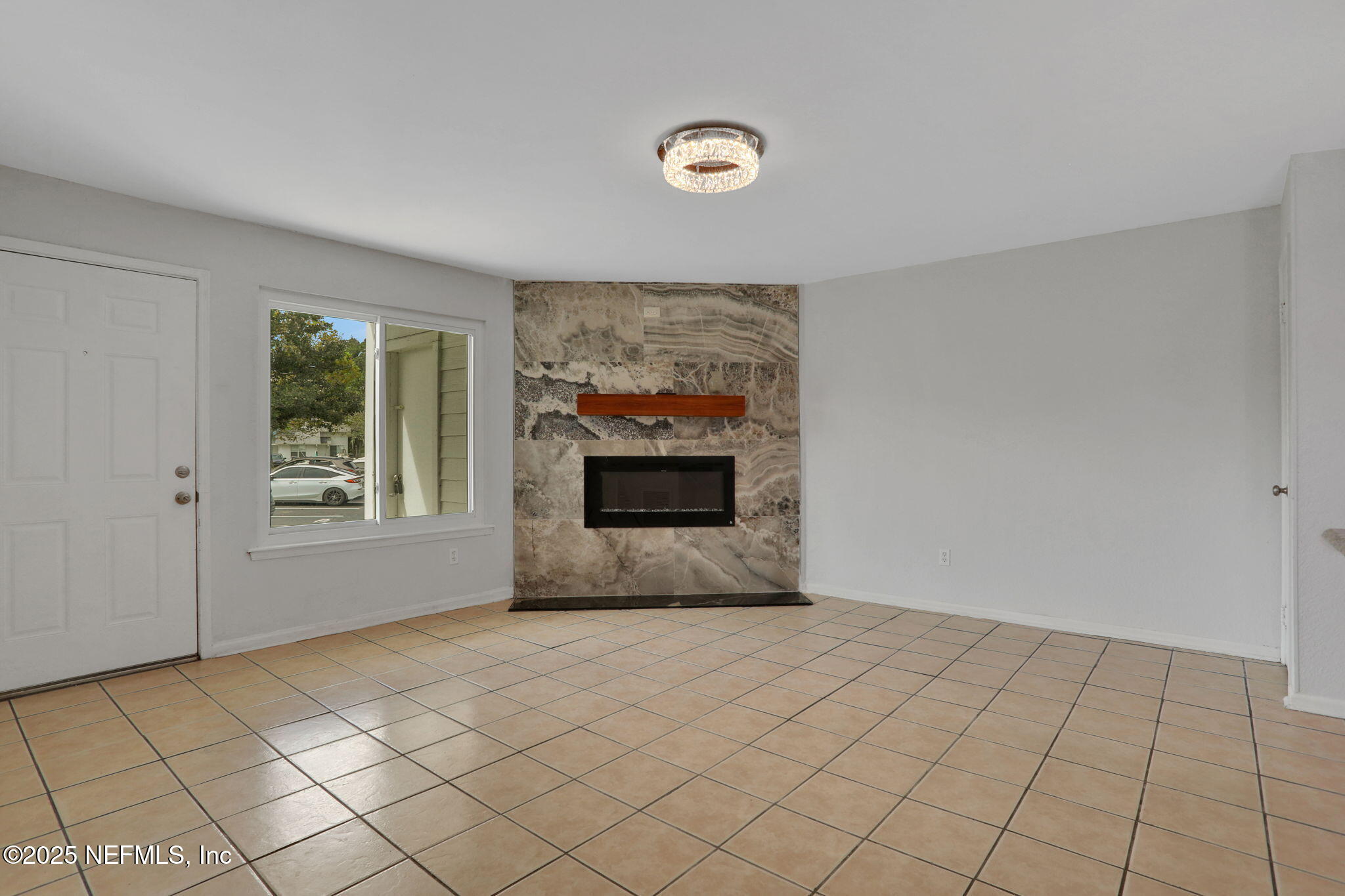 791 Assisi Lane, Unit 1704 Jacksonville, FL 32233 - Photo 2 of 16 a view of an empty room and window