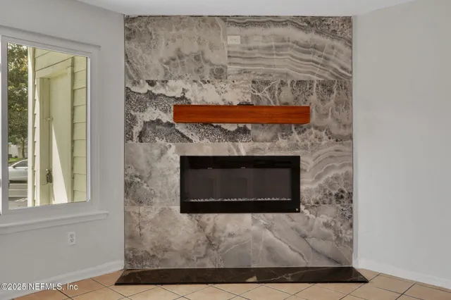 a living room with a fireplace