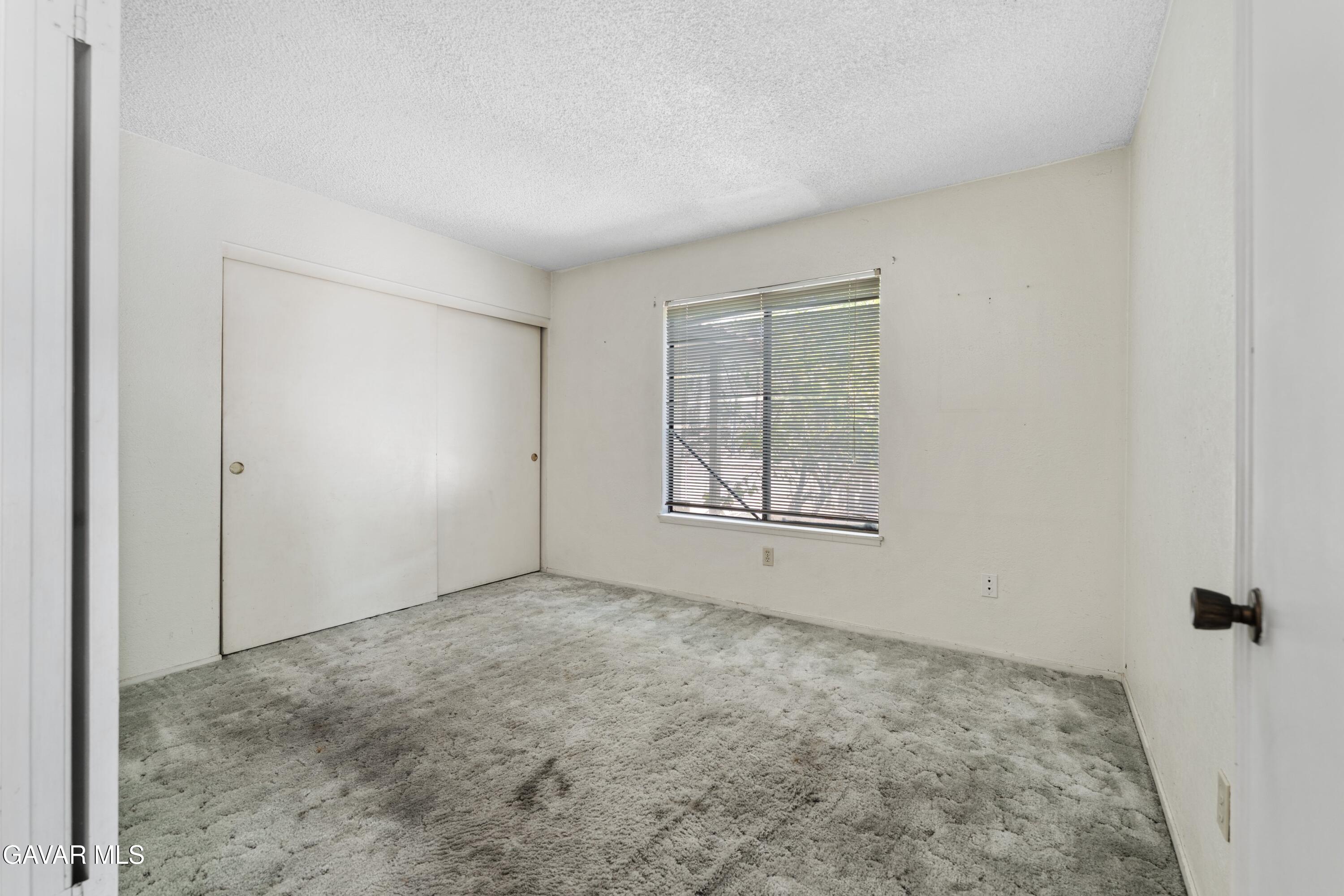 6113 Sard Street Rancho Cucamonga, CA 91701 - Photo 11 of 26 an empty room with windows