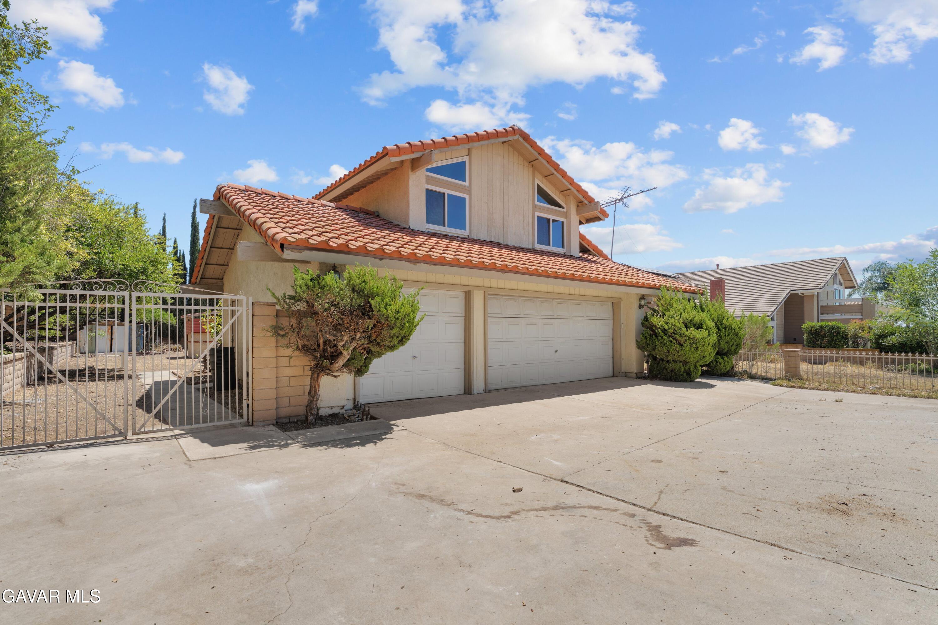 6113 Sard Street Rancho Cucamonga, CA 91701 - Photo 2 of 26 a view of a house with a yard