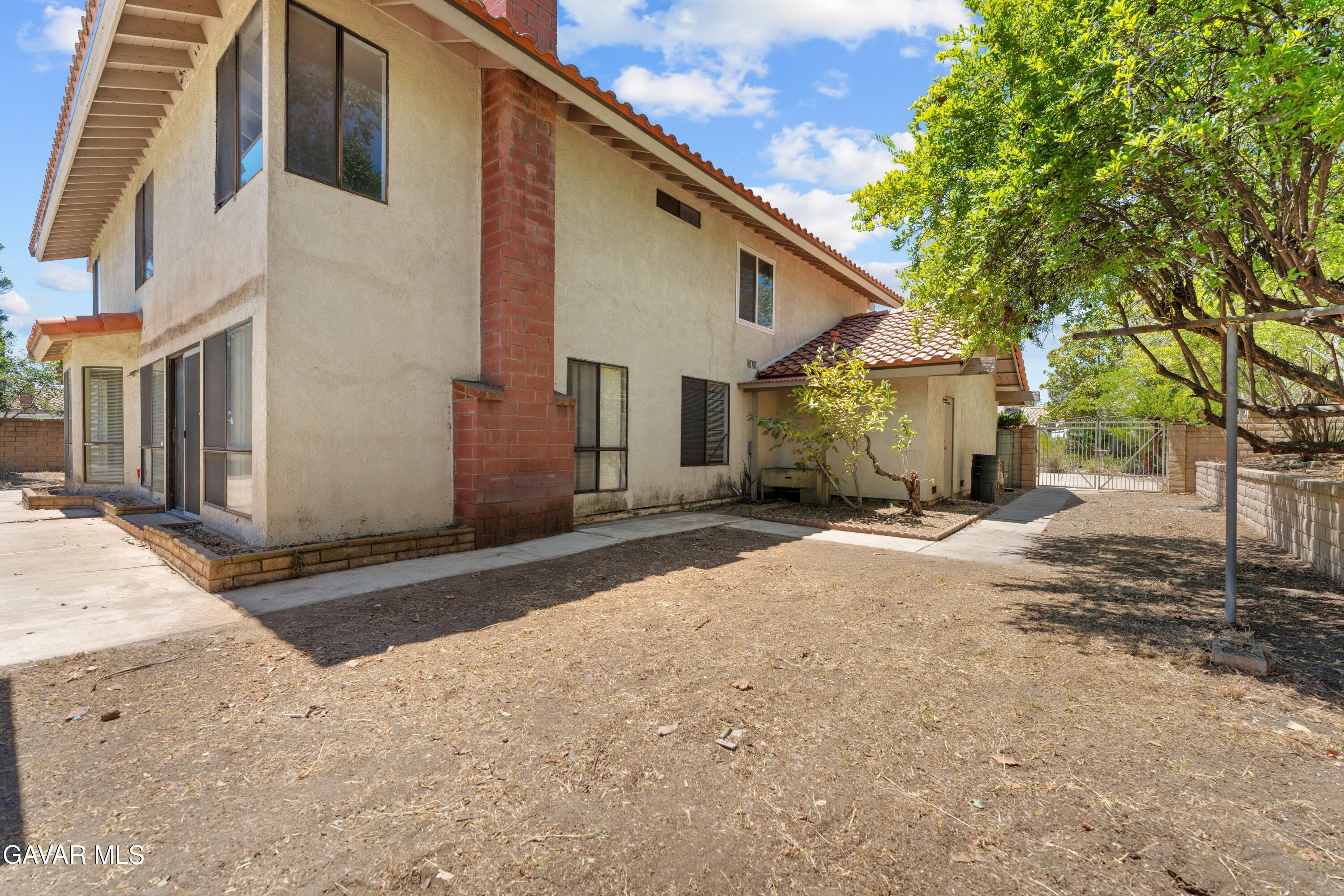6113 Sard Street Rancho Cucamonga, CA 91701 - Photo 26 of 26 a front view of a house with a yard