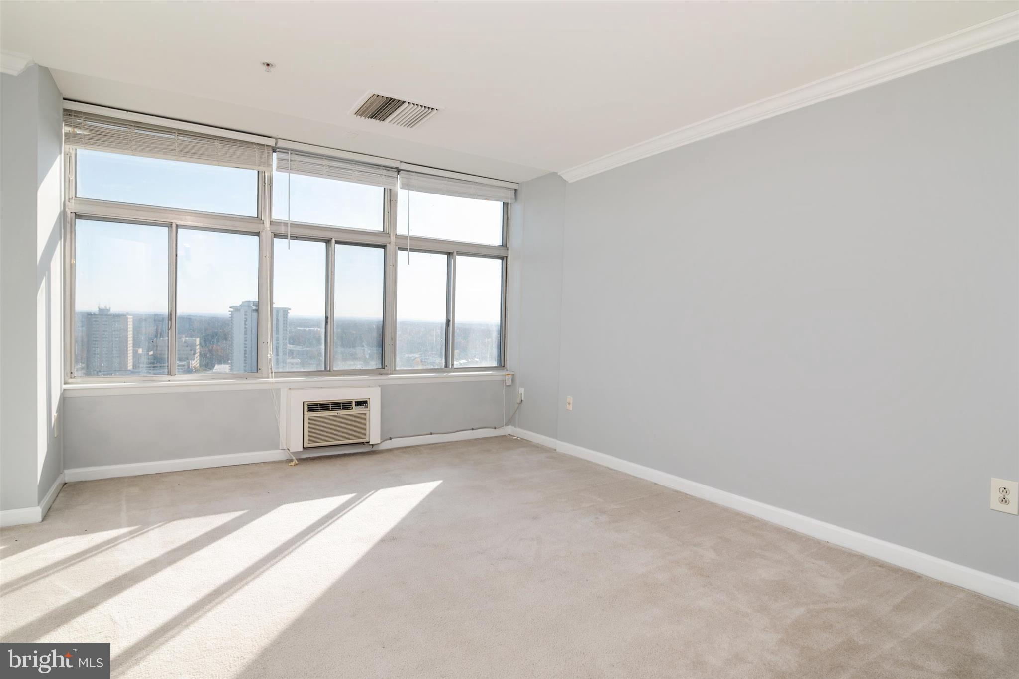 28 Allegheny Avenue, Unit 2710 Towson, MD 21204 - Photo 21 of 40 a view of an empty room with a window
