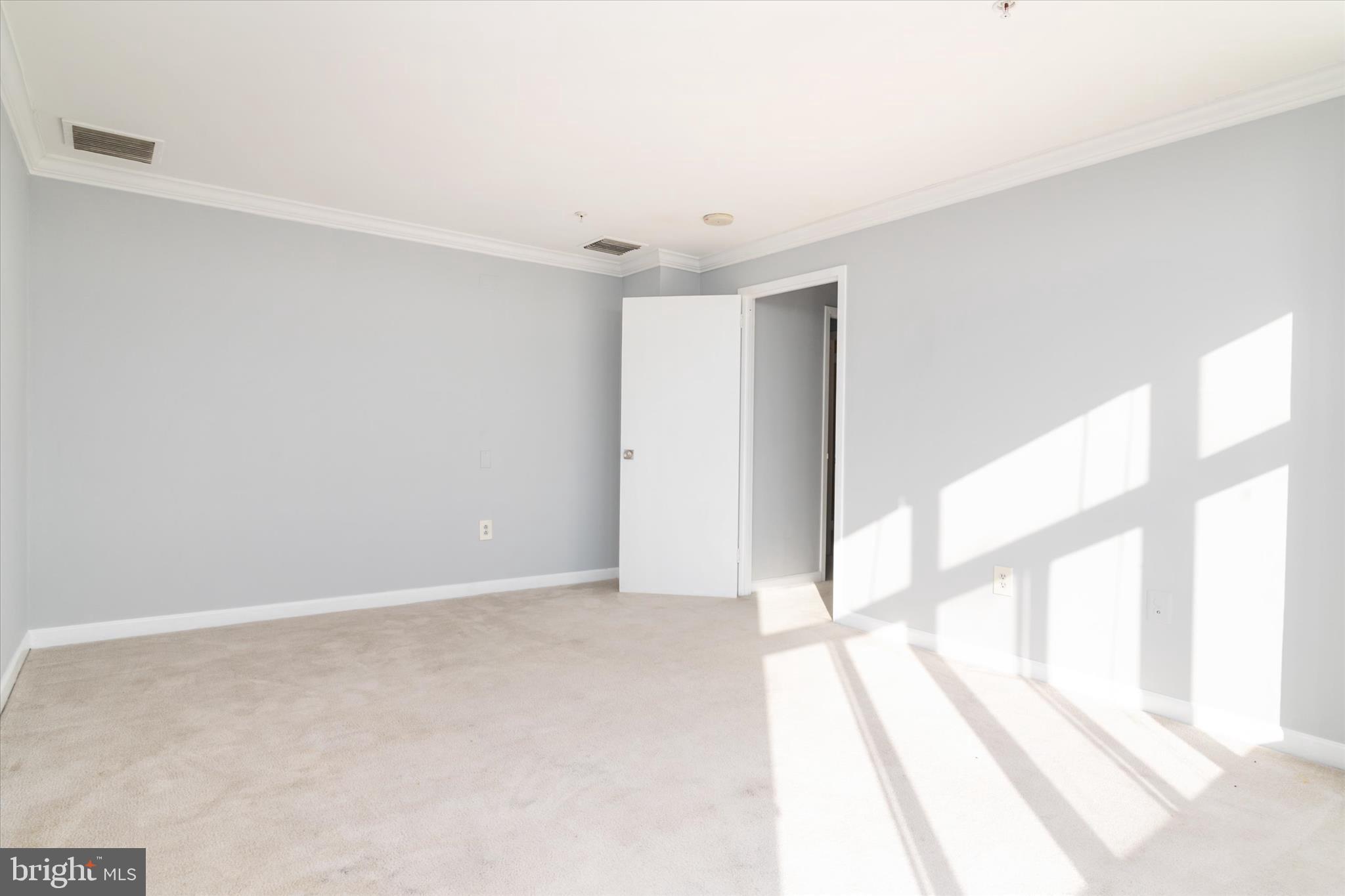 28 Allegheny Avenue, Unit 2710 Towson, MD 21204 - Photo 25 of 40 a view of an empty room with a window