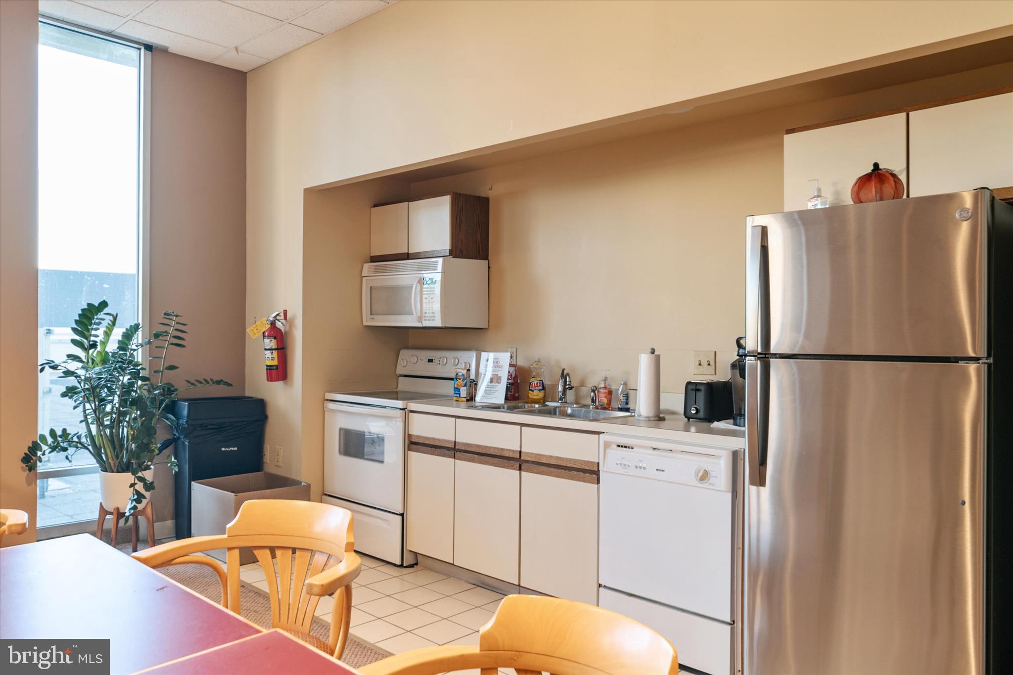 28 Allegheny Avenue, Unit 2710 Towson, MD 21204 - Photo 35 of 40 a kitchen with a sink appliances and cabinets