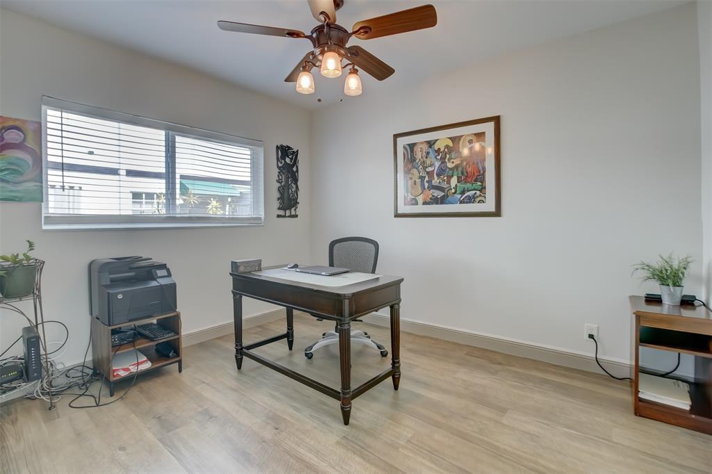 1450 North Riverside Drive, Unit 101 Pompano Beach, FL 33062 - Photo 27 of 52 a view of a workspace with furniture and a window