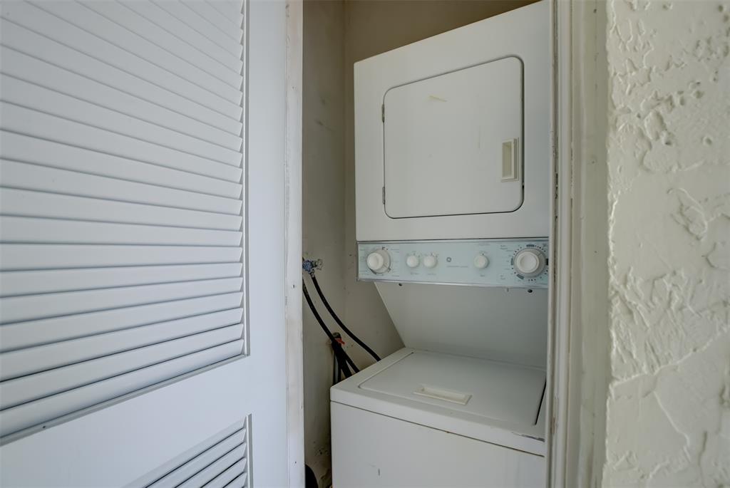 1450 North Riverside Drive, Unit 101 Pompano Beach, FL 33062 - Photo 32 of 52 a utility room with dryer and washer