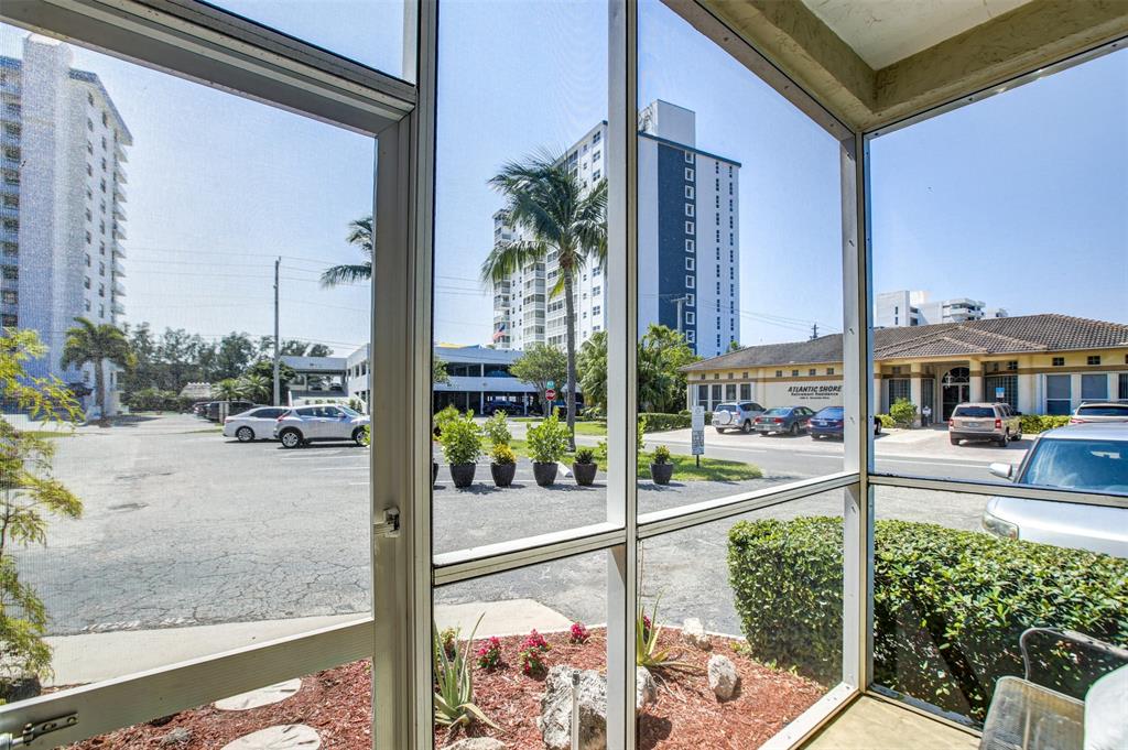 1450 North Riverside Drive, Unit 101 Pompano Beach, FL 33062 - Photo 36 of 52 a view of outdoor living space with furniture