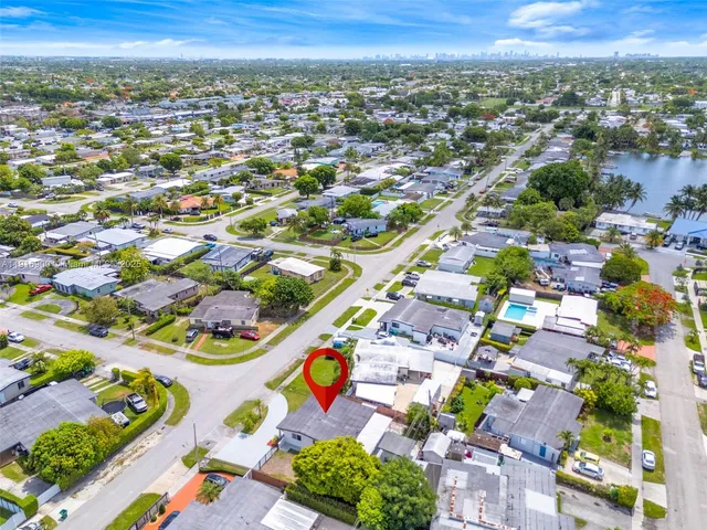 an aerial view of residential building and street