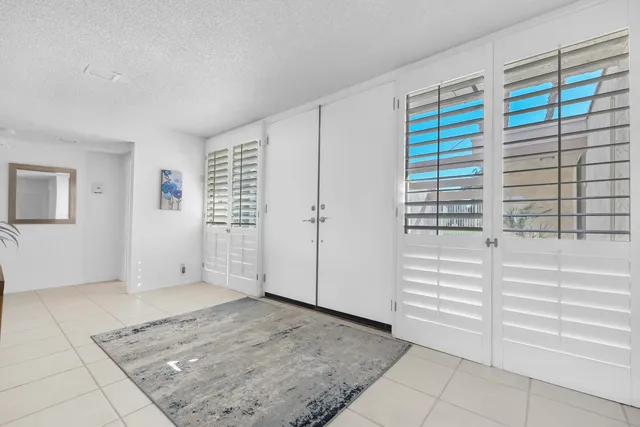a view of a livingroom with a large window